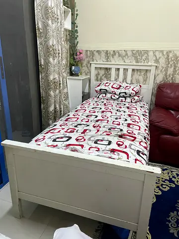 Single white wooden bed frame and mattress only