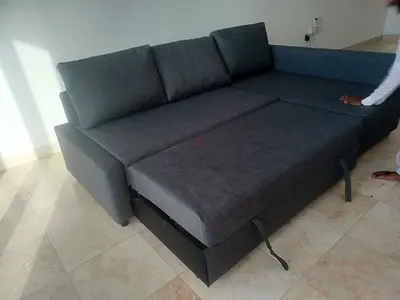 Grey L-shaped Sofa Bed with Storage — Good Condition