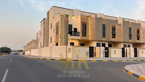 Distinctive corner villa near the Emirates Road exit and close to amenities | Ground floor, first floor, and roof; ~4 master bedrooms | Plot area: 2,3