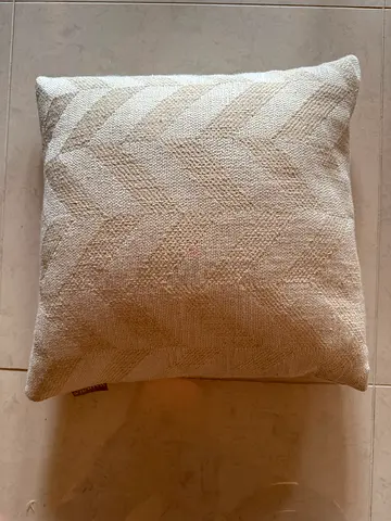 Beige textured decorative throw cushion, 45x45cm, AED 30