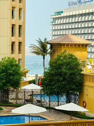 Premium 1-Bedroom Residence with Pool & Sea Views – JBR , DUBAI