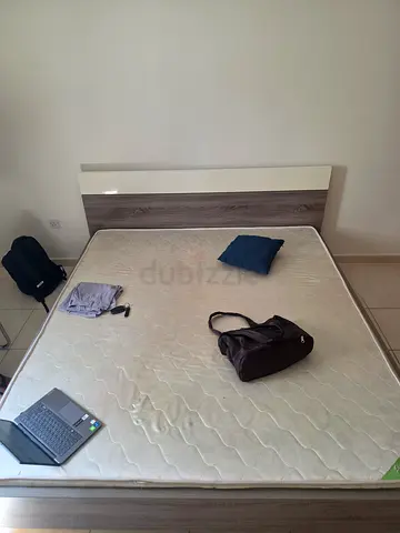 Queen bed frame with mattress and headboard — good condition