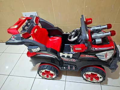 Kids Electric Ride-On Army Jeep with Lights and Sound - Good Condition