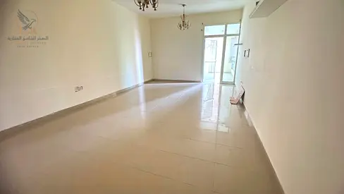 A spacious one-bedroom apartment with a living room and sea view at Horizon Tower Features include