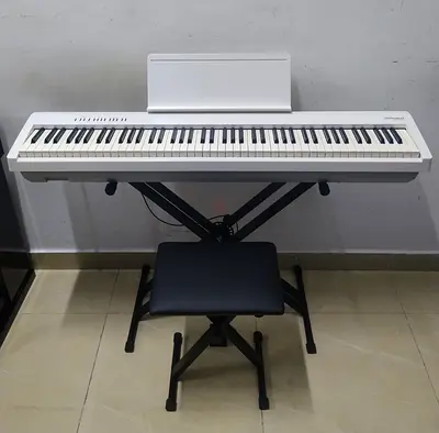 The Roland FP-30X WH is a portable 88-key white digital piano featuring Roland's SuperNATURAL sound