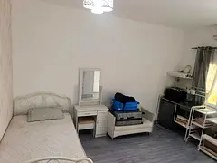 Room available for working ladies in private villa al wasl behind box park.