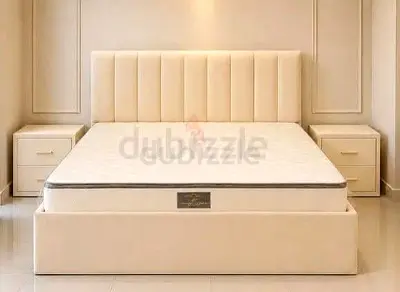 Beige Upholstered Double Bed size 180x200 and spring Toper Mattress.