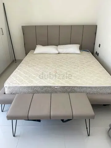 King bed frame with upholstered headboard and matching bench - good condition