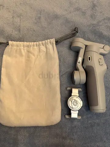 DJI Osmo Mobile handheld smartphone gimbal with magnetic phone holder