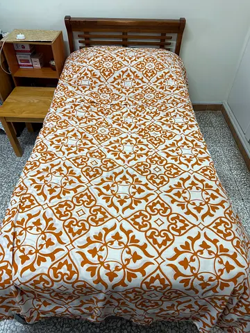 Single wooden bed frame with mattress
