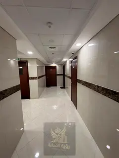 Brand-new 1-bedroom apartment with a living room available for annual rent in Al Taawun.