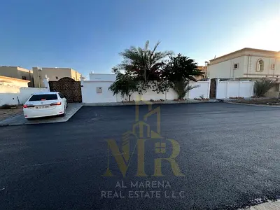 An exceptional opportunity in Al Rawda 2, Ajman | 10,000 sq. ft. villa | 5 master bedrooms | Rooftop terrace | Electricity, water, and A/C included |