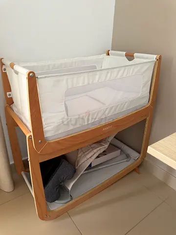 Wooden bedside bassinet / cradle in good condition