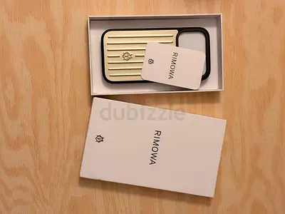 Rimowa luxury phone case titanium gold iPhone 17 pro