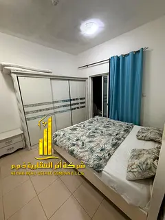 Luxury apartment, second occupancy, one bedroom, living room with open balcony. Ajman City Tower. Fu