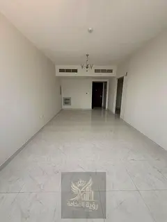 Brand-new 2-bedroom apartment with a living room available for annual rent in Al Taawun, first occup