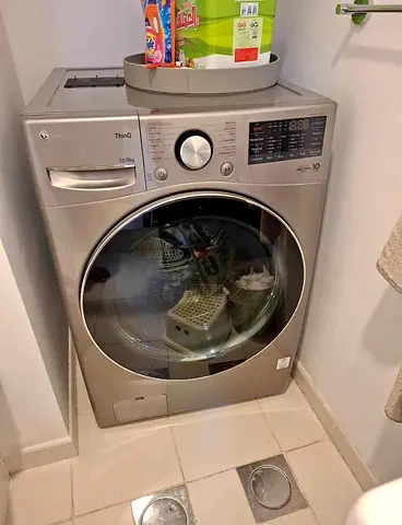 LG 13 kg washer and 8 kg dryer 2 in one new model slightly used