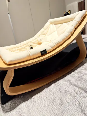 never used Baby Rocker/Bassinet - Wooden Frame with Padded Fabric