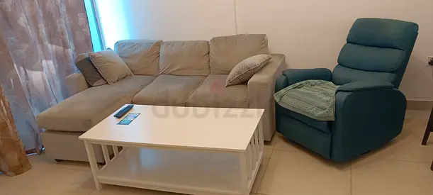 3-seater L-shaped sofa with recliner armchair and coffee table - good condition