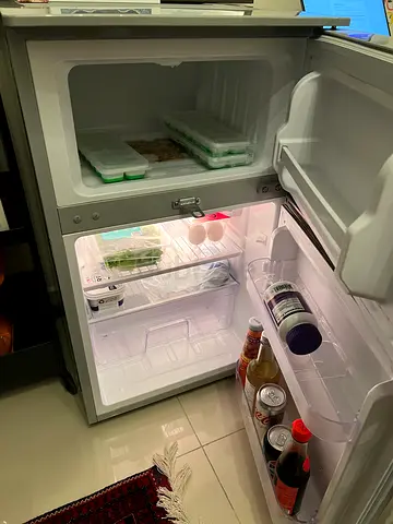 Compact single-door refrigerator with top freezer – good condition