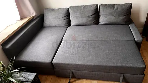 Grey L-shaped Sofa Bed with Storage - Good Condition