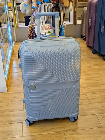 10-20 kg Light grey hard-shell spinner suitcase with telescopic handle - medium