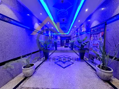 Spacious studio with Balcony | 12 Cheques | 10 Days Free | Roadside Building