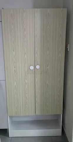 Light wood two-door wardrobe with bottom shelf - good condition