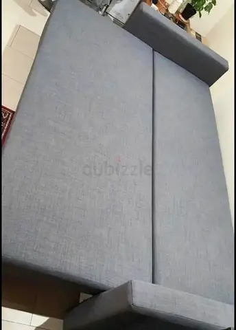 Grey fabric 3 seater sofa bed in good condition