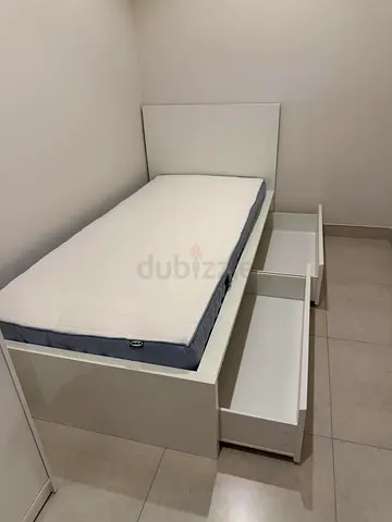 IKEA Malm single size storage bed frame with IKEA mattress Available in excellent condition Two st
