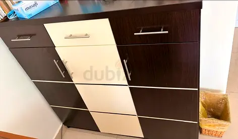 Two-tone wooden storage cabinet with drawers and cupboard - good condition