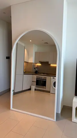 Full-length arched floor mirror with white frame - good condition