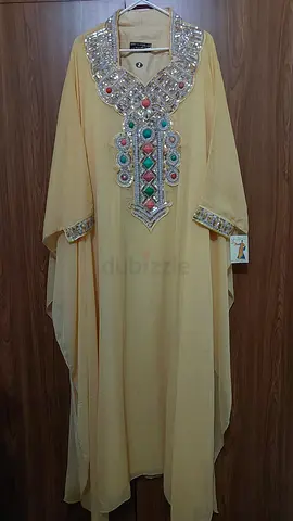 Yellow embellished women's kaftan / abaya-style dress with mirror work