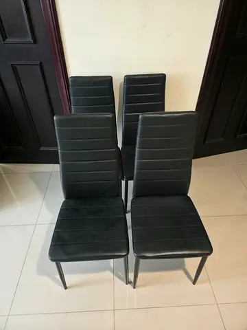Set of 4 modern black faux leather dining chairs with metal legs