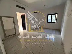 Two rooms and a living room with a balcony for annual rent at AED 28,000.