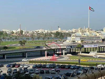 2BR + Hall, Free Parking & Balcony, Security Deposit Cheque Not Cashed. Prime location near services & Dubai exit.