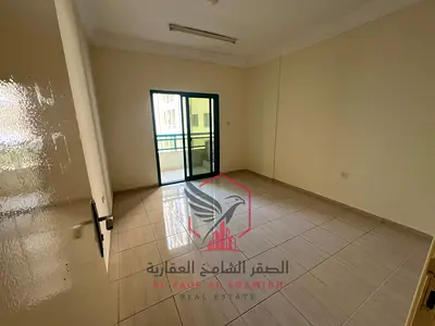 1BR + Hall in Al Qasimia, Al Nad, with Balcony. Prime location near cafes, shops & Dubai exit.