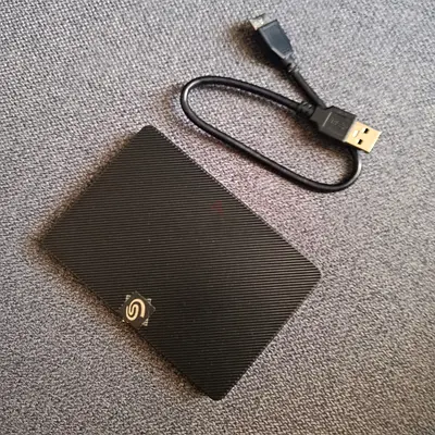 Seagate Portable 1TB External Hard Drive with Cable - Good Condition