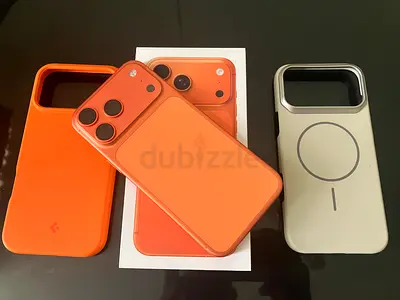 iPhone 17 Pro Max (Orange) with Two Cases and Box