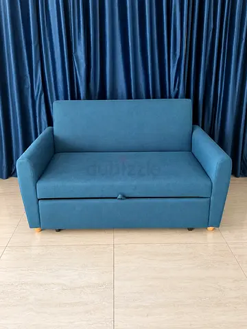 Compact Blue 2-Seater Sofa Bed in Good Condition