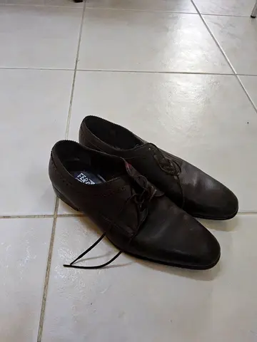 Used brown men's leather dress shoes - size not specified, good condition