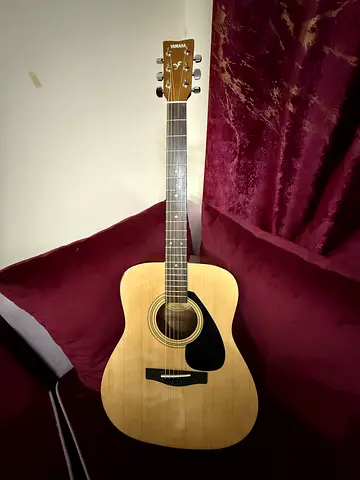 Yamaha F310 acoustic guitar.