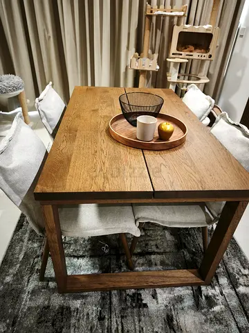 Solid wood dining table with 6 padded chairs - used, good condition