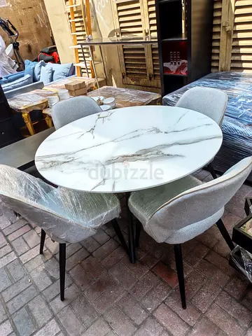 4-Seater Round Marble-Top Dining Table with Grey Upholstered Chairs