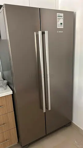 Bosch Side-by-Side Refrigerator - Good Condition, Stainless Finish