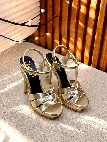 Gold high-heel platform sandals — size not specified, gently used