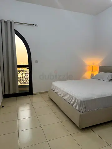 No commission - Master bedroom with attached bath & balcony.