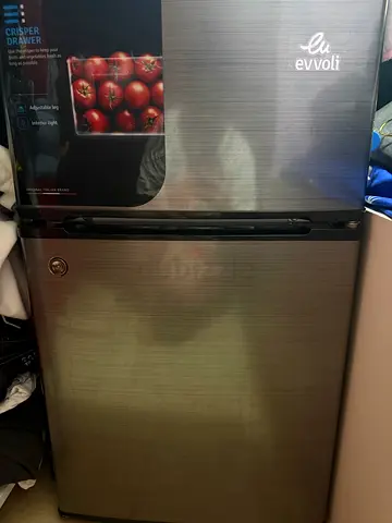 Compact mini fridge with freezer compartment - good working condition