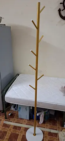 Tall gold metal coat rack / standing garment hanger - good condition