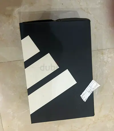 Adidas black shoes for sale just for 100 aed with box